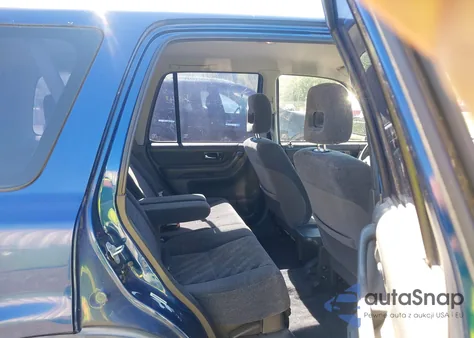 1999 Honda Cr-V Ex z USA, uszkodzony, nr VIN JHLRD1767XC074457